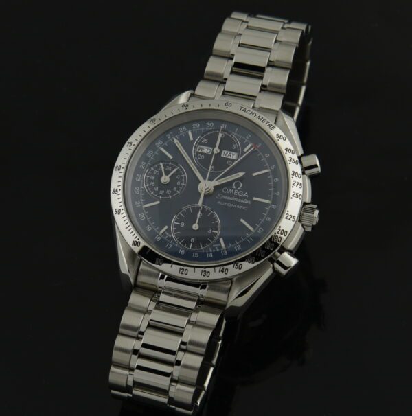 1995 Omega 39mm Speedmaster automatic winding stainless steel chronograph watch with original blue dial, overhauled movement and bracelet.