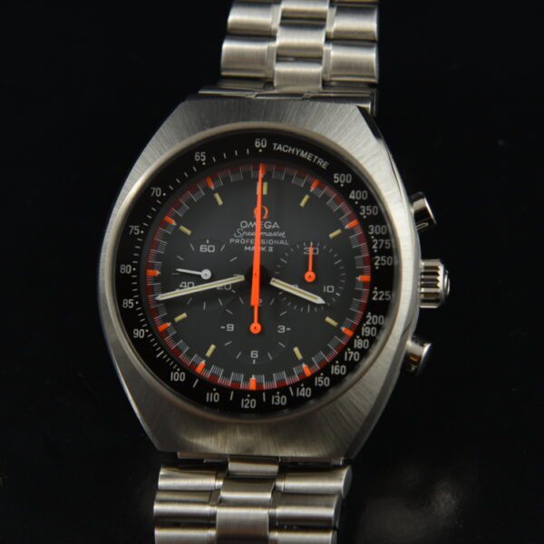 1970 Omega 44mm Speedmaster stainless steel chronograph watch with original racing dial, handset, and caliber 861 manual winding movement.