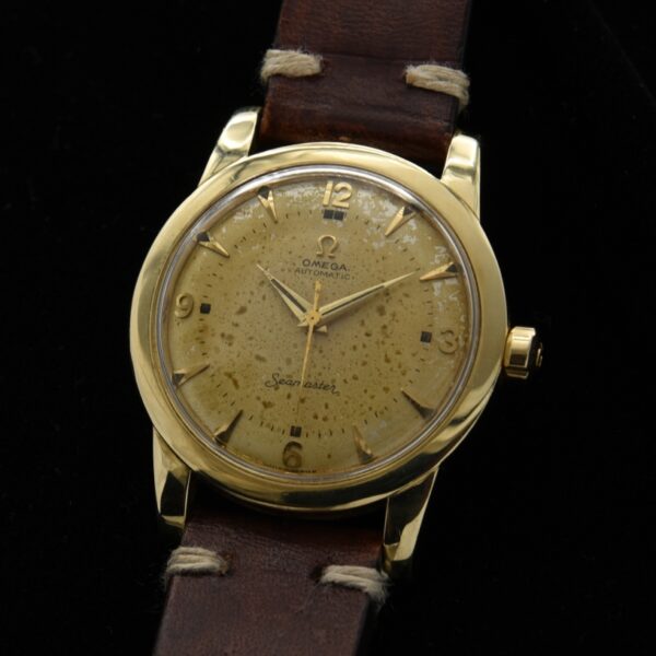 1951 Omega 34.5mm Seamaster watch with the bumper automatic winding caliber 351 movement, gold-capped steel case, and original dial/crown.