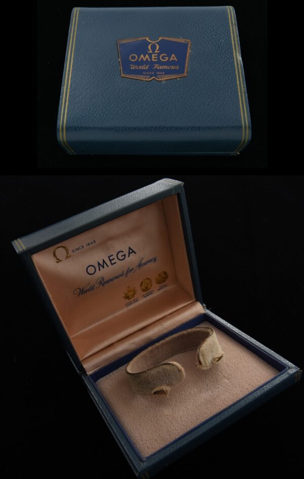 Vintage late 1940s Omega Box 3.75x4" with brass, enamel applied logo, and a silk interior.