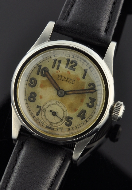 Rolex Oyster Lipton stainless steel WW2-era military watch with original small case, dial, Arabic numerals, and cleaned caliber 59 movement.