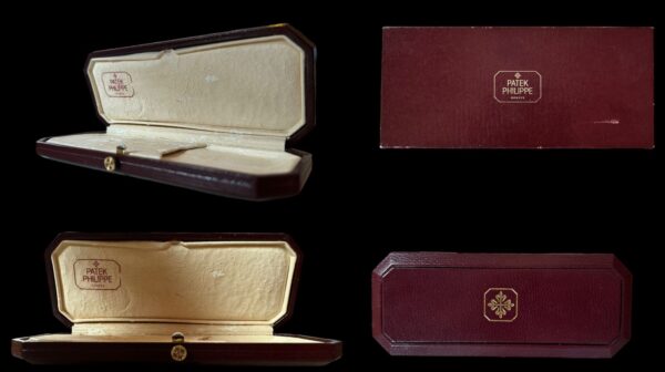 1990s Patek Philippe coffin-shaped mens watch box measuring 2.5x6" with original inner box and outer cardboard/leatherette box.