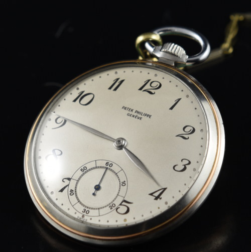 Patek Philippe 45mm gold and steel pocket watch with original expertly refinished dial, case, chain, and cleaned manual winding movement.