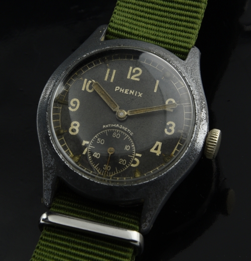 1940s Phenix chrome-plated WW2 German military watch with original black dial, pencil hands, gun-metal case, and cleaned AS 1130 movement.