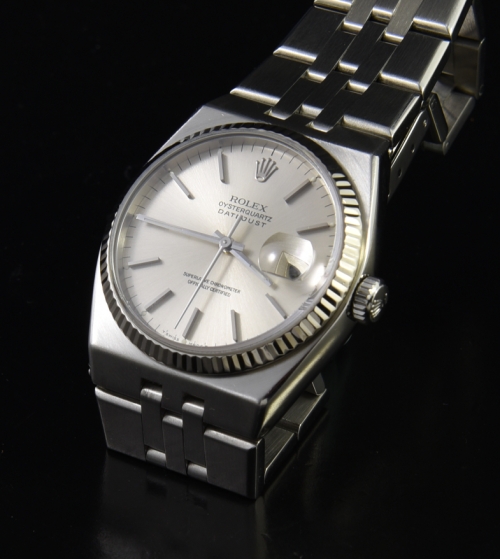 Rolex Oysterquartz Datejust stainless steel watch with original white-gold bezel, case, sapphire crystal, and electronic quartz movement.