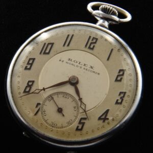 1930s Rolex stainless steel pocket watch with original case, two-tone dial, handset, and manual winding movement adjusted to six positions.