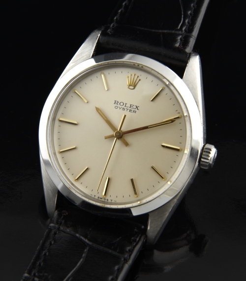 1963 Rolex Oyster 36mm stainless steel oversized watch with original clean dial, baton hands, and robust, accurate manual winding movement.