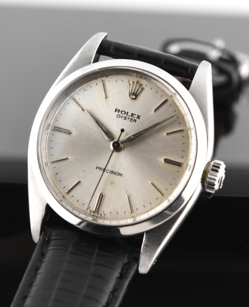 1959 Rolex Oyster stainless steel watch with original case, restored silver dial, Dauphine hands, and clean, robust manual winding movement.