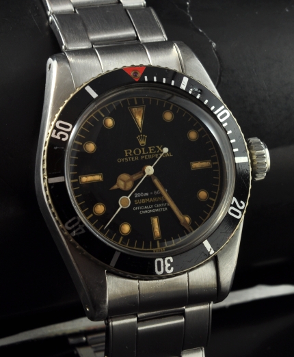 1957 James Bond Rolex Submariner stainless steel watch with original restored dial, large Brevet crown, handset, and caliber 1030 movement.