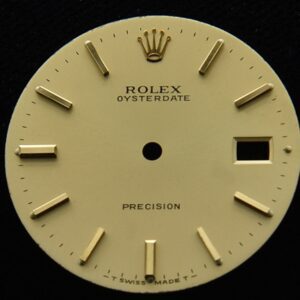 This gold Rolex Oysterdate 6694 dial is all original, near perfect and even has its original Rolex packaging.