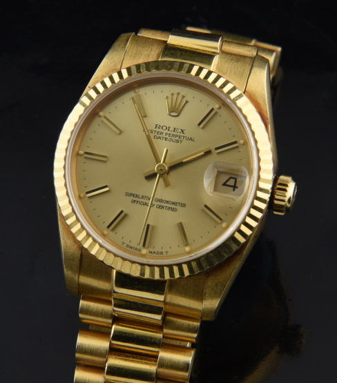 1984 Rolex 31mm Datejust 18k solid-gold watch with original tight bracelet, sapphire crystal, dial, unpolished case, and cleaned movement.