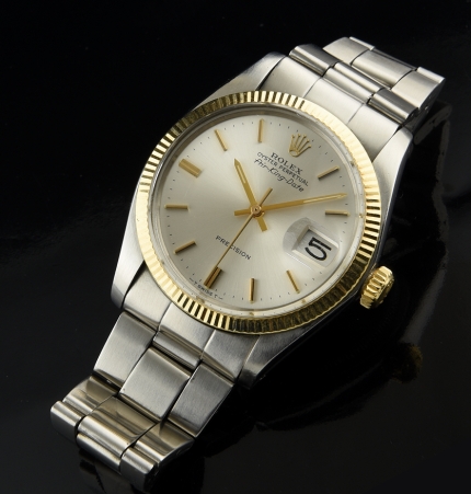 1973 Rolex Oyster Perpetual Air-King Date stainless steel watch with original gold bezel, dial, new crystal, and caliber 1520 movement.