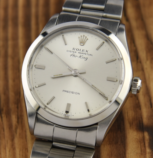 1967 Rolex 34mm Air-King stainless steel watch with original aged dial, folded Oyster bracelet, and automatic winding caliber 1520 movement.