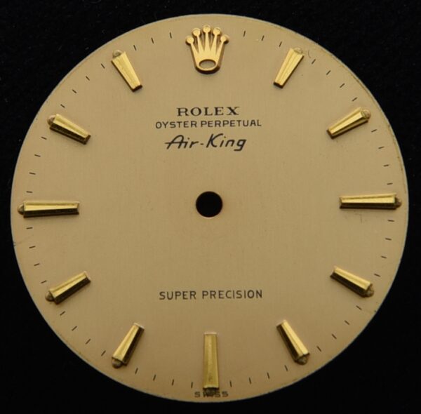 This is a 1950s-1960s Rolex Air-King Super Precision gold dial with gold markers in all original condition and almost pristine.