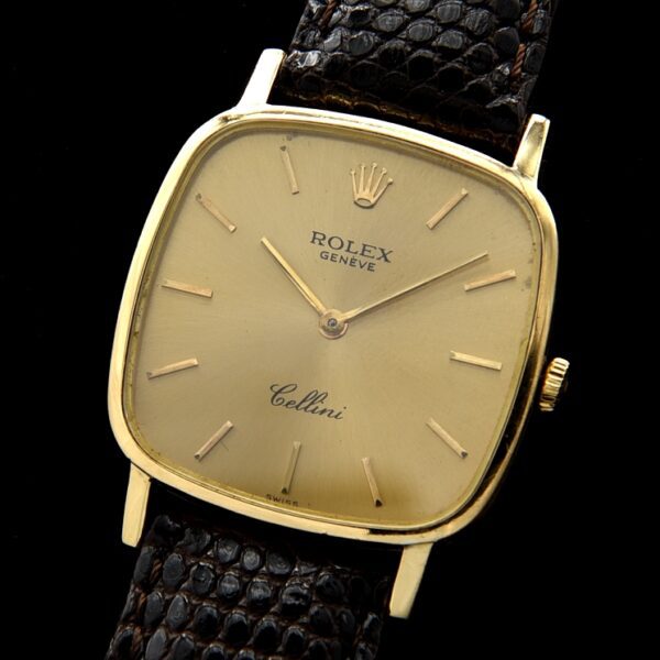 1975 Rolex 30x37.5mm Cellini 18k solid-gold mens watch with original television-shaped case, winding crown, and manual winding movement.