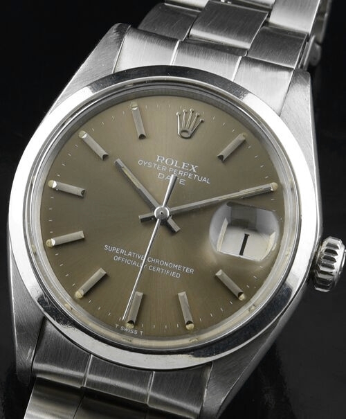 1970 Rolex Oyster Perpetual Date stainless steel watch with original uncommon slate dial, hands, bracelet, and automatic winding movement.