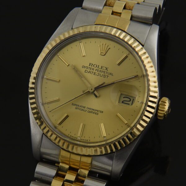 1982 Rolex 36mm Datejust two-tone 18k gold stainless steel watch with original Jubilee bracelet, champagne dial, and caliber 3035 movement.