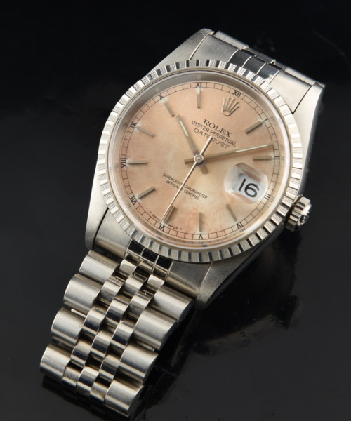 1993 Rolex Datejust stainless steel watch with original rosé dial, sapphire crystal, tight Jubilee bracelet, and automatic winding movement.