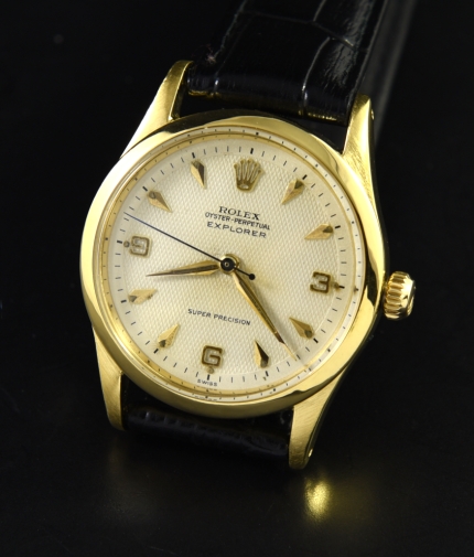 1957 Rolex Explorer Super Precision gold-plated dress watch with original dial, case, winding crown, and caliber 1530 automatic movement.