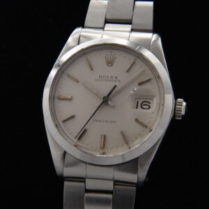 1964 Rolex 34mm Oysterdate stainless steel manual winding watch with all original dial, markers, no scratches, and fully serviced movement.