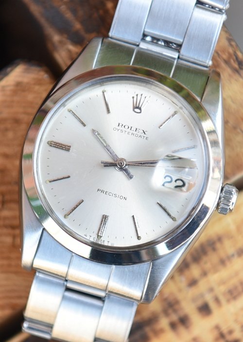 1967 Rolex 34mm Oysterdate Precision stainless steel watch with original case, dial, Oyster bracelet, and cleaned manual winding movement.