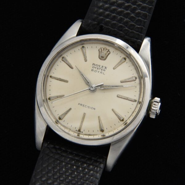 1959 Rolex Oyster Royal 34.5mm manual winding stainless steel watch with original eggshell dial, elongated markers, Alpha hands, and lume.