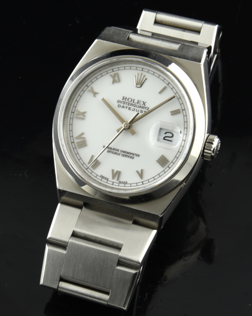 1998 Rolex 36.5mm Datejust Oysterquartz stainless steel watch with original Roman-numeral snow-white dial, case, and accurate movement.