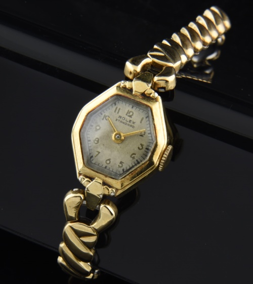 1940s Rolex 26mm Standard sterling silver ladies cocktail watch with original gold-filled case, dial, and signed manual winding movement.