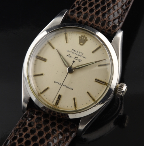 1958 Rolex Air-King Super Precision stainless steel watch with original eggshell dial, Dauphine hands, and caliber 1530 automatic movement.