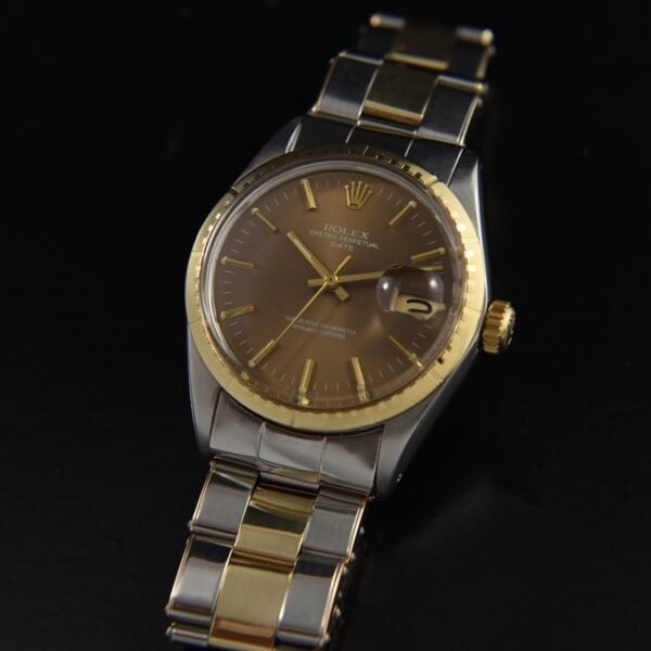 1971 Rolex 34mm Oyster Perpetual Date 14k gold and stainless steel watch with original root beer dial, bracelet, and caliber 1570 movement.