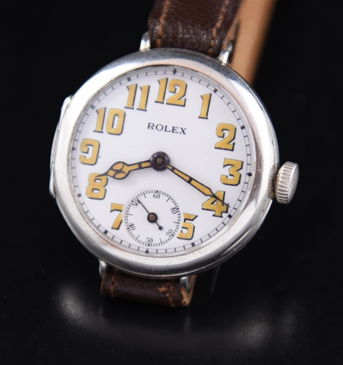 1915 Rolex sterling-silver WW1-era trench watch with original porcelain dial, restored lume, re-done print, and manual winding movement.