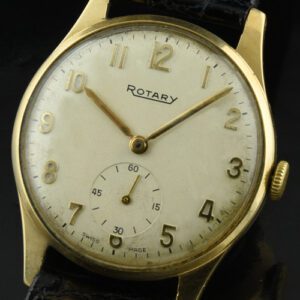 1950s Rotary 9k solid-gold watch with original raised Arabic numerals, sub-seconds, dial, and clean, accurate manual winding Swiss movement.
