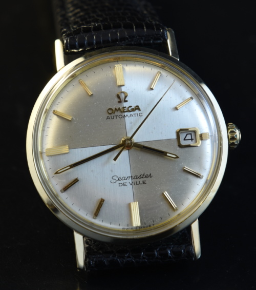 1960s Omega Seamaster De Ville stainless steel watch with original quadrant dial, hands, hesalite crystal, and automatic winding movement.