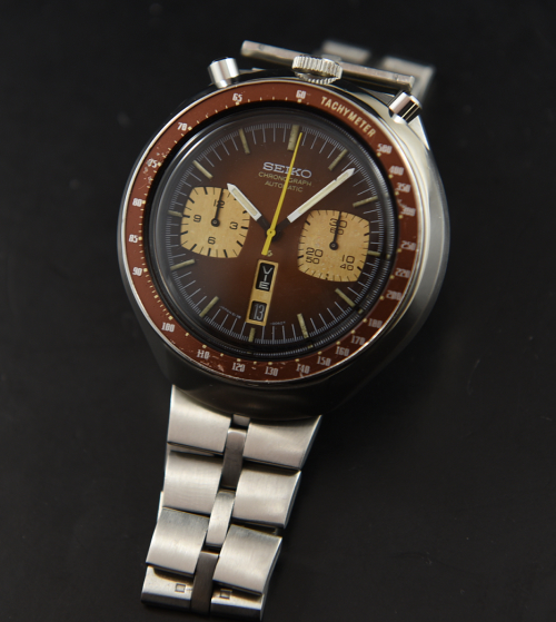 1970s Seiko 43.5mm Bullhead stainless steel chronograph watch with original restored case, bracelet, coffee patina, and automatic movement.