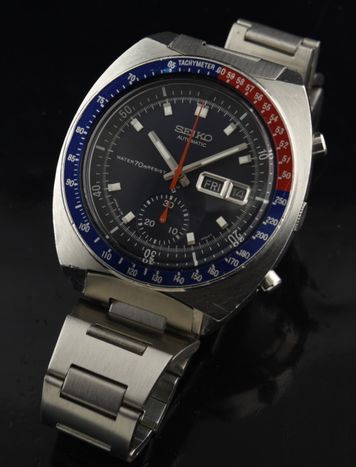 1970s Seiko Pogue stainless steel chronograph watch with original crown, bezel, crystal, dial, aftermarket bracelet, and automatic movement.