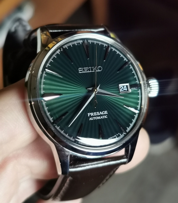 2020 Seiko SRPD37J1 Presage stainless steel watch with colour-changing green dial, screw-back case, calfskin band, and three-fold clasp.