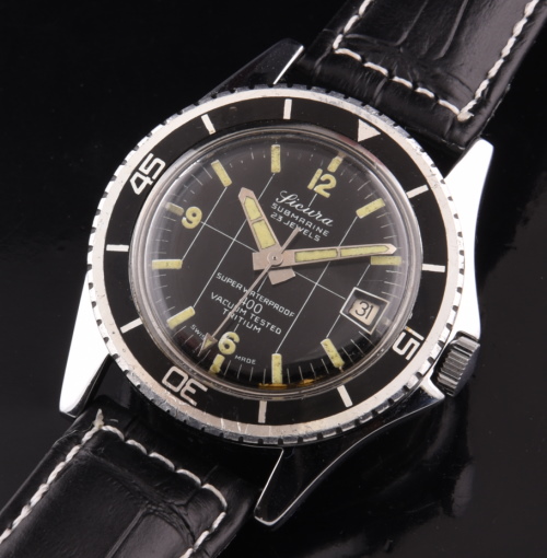 1960s Sicura 38.5mm Submarine 400 chrome-plated dive watch with original pointed crown guards, turning bezel, and manual winding movement.