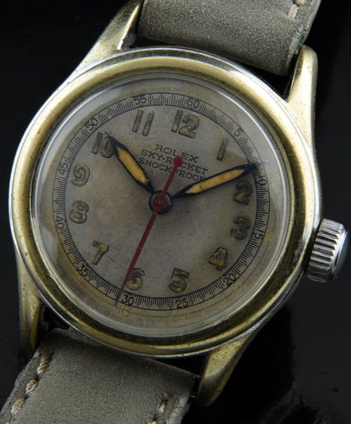 1942 Rolex Skyrocket sterling silver WW2-era military watch with original signed case back, unpolished dial, and caliber 59 manual movement.