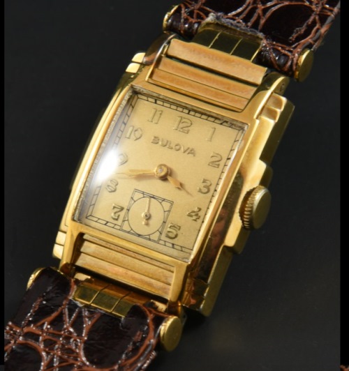 1938 Bulova Broadcaster gold-filled watch with original swing lugs, case, restored dial, Breguet numerals, and manual winding movement.