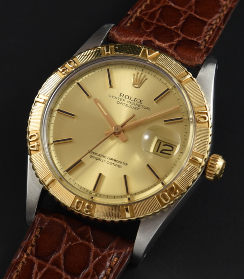 1977 Rolex 36mm Oyster Perpetual Datejust gold watch with original thunderbird bezel, dial, and caliber 1570 automatic winding movement.