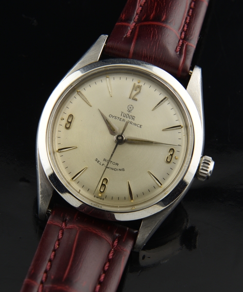 1959 Tudor stainless steel watch with original Rolex-Explorer dial, Dauphine hands, Oyster case, and cleaned automatic winding movement.