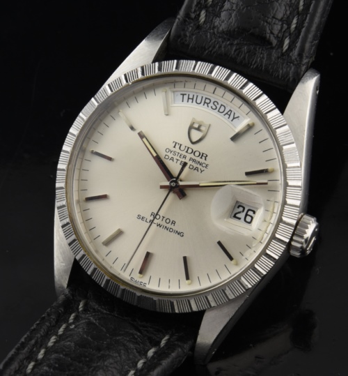 Tudor 36mm Oyster Prince Day-Date stainless steel watch with original crenelated bezel, Rolex case, dial, hands, and automatic movement.