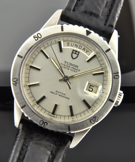 1970s Tudor Oyster Prince Date-Day stainless steel watch in near-pristine condition with original rotating bezel, silver dial, and handset.