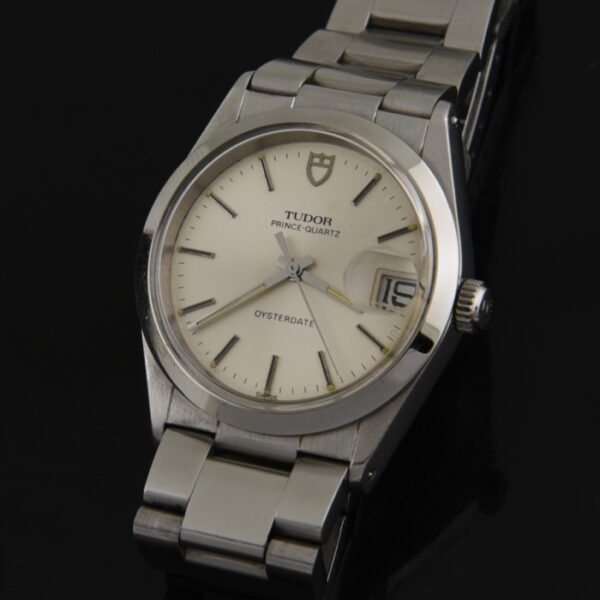 1980s Tudor Prince 34.5mm Quartz Oysterdate stainless steel watch with original case, Rolex bracelet, movement, and quick-set date feature.