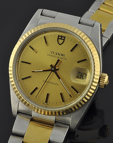 1980s Tudor Prince-Quartz Oysterdate stainless steel watch with original quick-set date feature, case, 14k gold bezel, and bracelet.