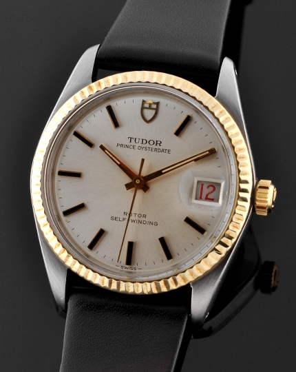 Tudor Prince Oysterdate stainless steel watch with original solid-gold bezel, Rolex winding crown, and cleaned automatic winding movement.