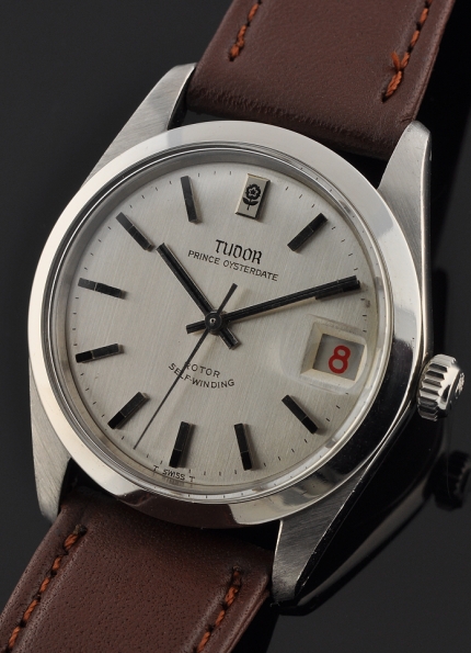 1950s Tudor Prince Oysterdate stainless steel watch with original Rolex case, winding crown, dial, baton hands, and automatic movement.