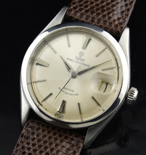 1964 Tudor 34.5mm Prince Oysterdate stainless steel watch with original small rose dial, Dauphine hands, Rolex case, and automatic movement.