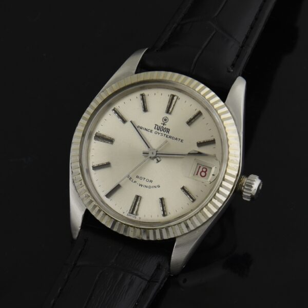 1960s Tudor Prince 34.5mm Oysterdate 14k white gold watch with original case, dial, hands, and uncommon date feature with roulette numerals.