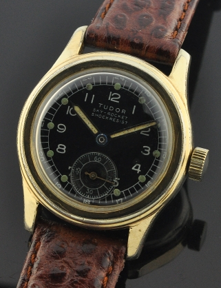 1940s Tudor Sky-Rocket Canadian-version 29.2mm gold-plated pilot's watch with original case, and dustproof winding crown.